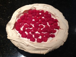Add whipped cream and fresh raspberries.